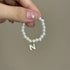 VERTRIX INNOVATIONS Mini Labubu 4.0 Pin & Pearl Necklace Accessories