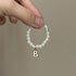 VERTRIX INNOVATIONS Mini Labubu 4.0 Pin & Pearl Necklace Accessories